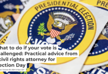 Stickers on a table on the first day of Virginia’s in-person early voting, Sept. 20, 2024, in Arlington. Andrew Harnik/Getty Images